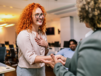 Woman introducing herself