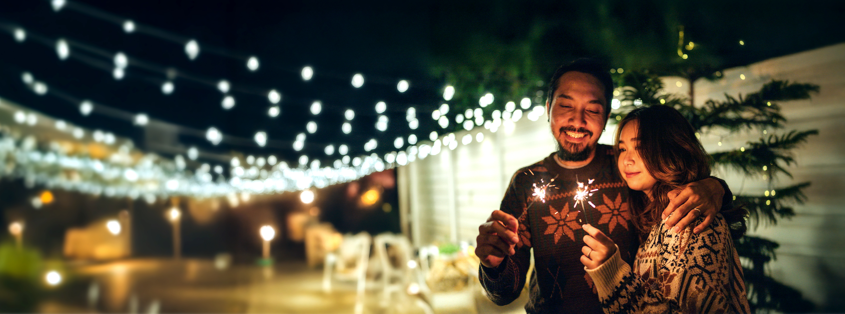 Couple enjoying holiday lights