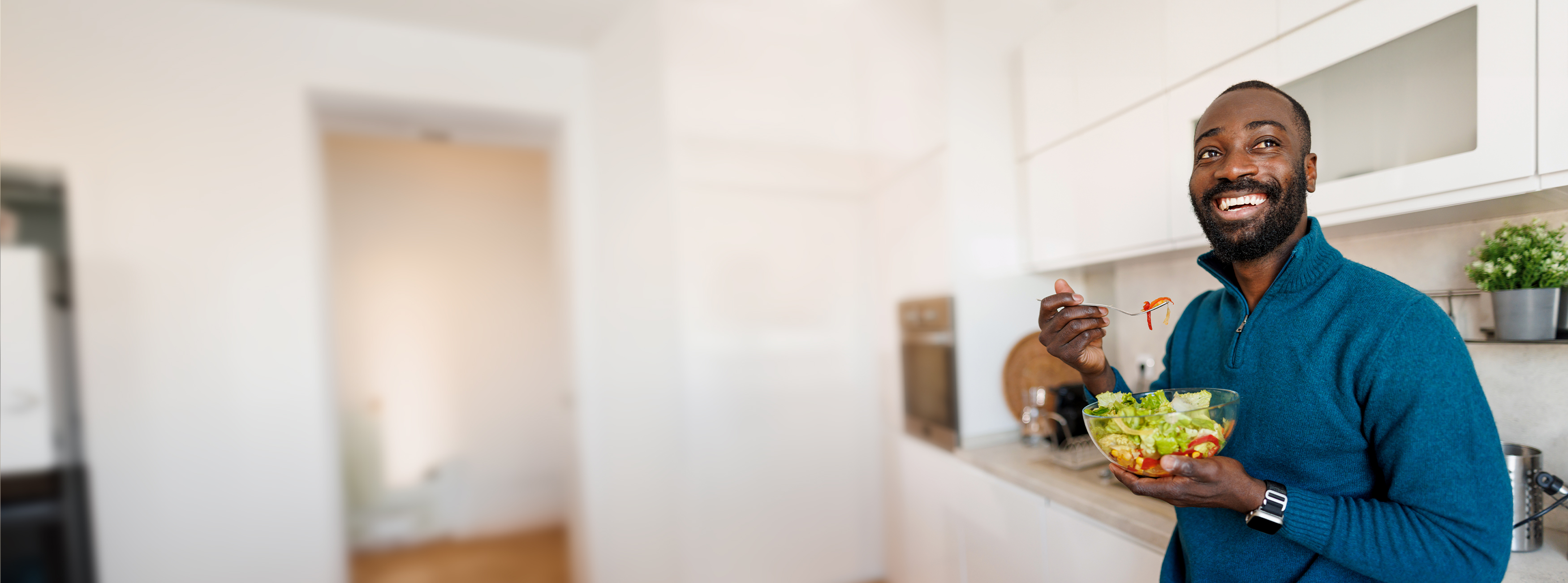 Man eating salad